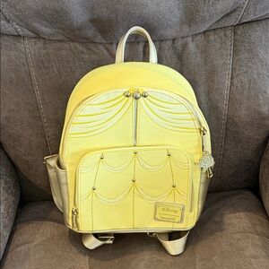 Disney’s  lounge fly bells, dress Yellow and Gold Backpack from beauty & beast